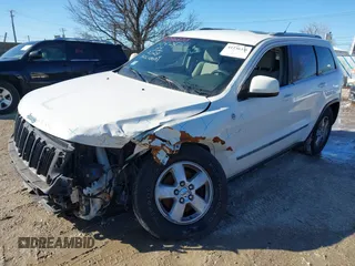 2012 Jeep Grand Cherokee Laredo with VIN 1C4RJFAGXCC224138, listed as a IAAI auction lot 41736375 with 133,383 mi miles. Bid and sale history available at carsss.com. Image 18.