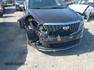 2021 Cadillac XT5 FWD Premium Luxury with VIN 1GYKNCRSXMZ118990, listed as a IAAI auction lot 41991857 with 92,085 mi miles and . Bid and sale history available at DreamBid. Image 6.