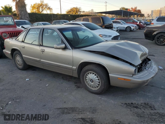 1996 Buick Regal Custom with VIN 2G4WB52K5T1517380, listed as a Copart auction lot 83106314 with 112,411 mi miles and Salvage title. Bid and sale history available at DreamBid. Image 4.