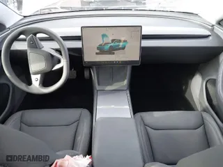 2025 Tesla Model 3 Long Range with VIN 5YJ3E1EA4SF914133, listed as a IAAI auction lot 41706994 with 1,932 mi miles. Bid and sale history available at carsss.com. Image 5.