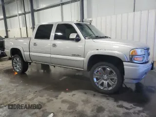 2006 GMC Sierra Denali z VIN 2GTEK63N661185470, wystawiony jako Copart lot #85517684 z przebiegiem 154 457 mil mil oraz Szkoda całkowita • Salvage title. Historia ofert i sprzedaży dostępna na DreamBid. Obrazek 4.