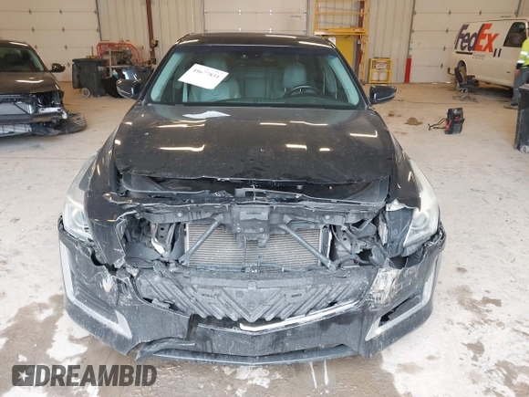 2014 Cadillac CTS Luxury AWD with VIN 1G6AX5SX2E0195357, listed as a IAAI auction lot 41677831 with 152,567 mi miles and . Bid and sale history available at DreamBid. Image 12.