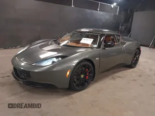 2013 Lotus Evora z VIN SCCLMDSU7DHA10025, wystawiony jako IAAI lot #41298776 z przebiegiem 18 194 mil mil oraz . Historia ofert i sprzedaży dostępna na DreamBid. Obrazek 2.