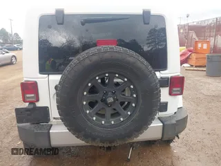 2014 Jeep Wrangler Unlimited Sahara z VIN 1C4BJWEG6EL245986, wystawiony jako IAAI lot #41498492 z przebiegiem 125 882 mil mil oraz . Historia ofert i sprzedaży dostępna na DreamBid. Obrazek 17.
