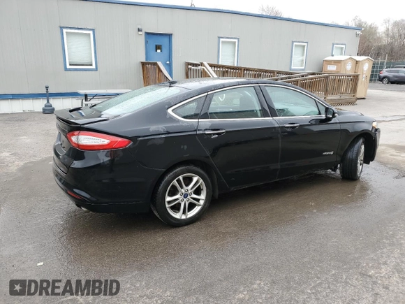 2016 Ford Fusion Titanium Hybrid with VIN 3FA6P0RU6GR324405, listed as a Copart auction lot 51382585 with 0 mi miles and Salvage Title. Bid and sale history available at carsss.com. Image 3.