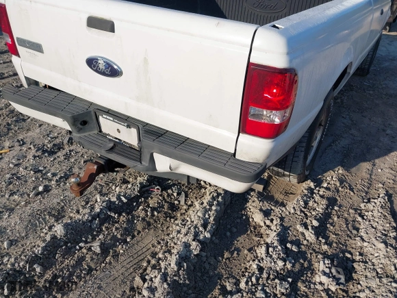 2010 Ford Ranger XL with VIN 1FTKR1EE6APA58051, listed as a IAAI auction lot 41650553 with 233,020 mi miles. Bid and sale history available at carsss.com. Image 6.