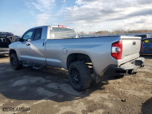 2014 Toyota Tundra 4WD Truck SR with VIN 5TFCY5F11EX016449, listed as a Copart auction lot 82401484 with 216,310 mi miles and Salvage Title. Bid and sale history available at carsss.com. Image 2.