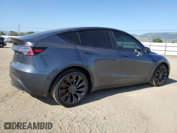 2022 Tesla Model Y Performance with VIN 7SAYGDEFXNF521502, listed as a Copart auction lot 56132745 with 73,339 mi miles and Salvage title. Bid and sale history available at DreamBid. Image 3.