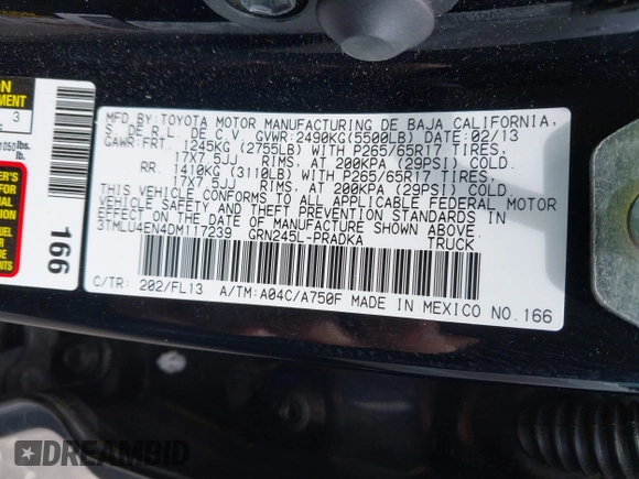 2013 Toyota Tacoma with VIN 3TMLU4EN4DM117239, listed as a IAAI auction lot 42494359 with 239,635 mi miles and . Bid and sale history available at DreamBid. Image 9.