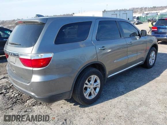 2013 Dodge Durango SXT with VIN 1C4RDJAG7DC559188, listed as a IAAI auction lot 41785126 with Not Provided miles and . Bid and sale history available at carsss.com. Image 4.