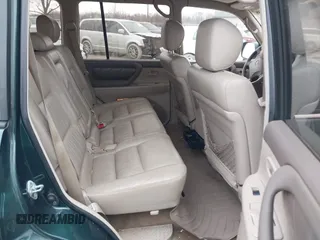 2000 Toyota Land Cruiser with VIN JT3HT05J8Y0084239, listed as a IAAI auction lot 41440548 with 240,000 mi miles. Bid and sale history available at carsss.com. Image 8.