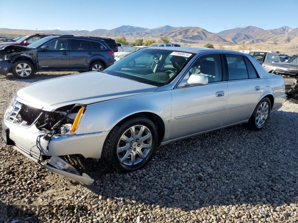 2009 Cadillac DTS 1SC z VIN 1G6KD57Y89U105190, wystawiony jako Copart lot #77560874 z przebiegiem 166 134 mil mil oraz Szkoda całkowita • Salvage title. Historia ofert i sprzedaży dostępna na DreamBid. Obrazek 1.