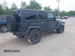 2016 Jeep Wrangler Unlimited Rubicon with VIN 1C4HJWFG6GL346862, listed as a IAAI auction lot 42441610 with 94,227 mi miles and . Bid and sale history available at DreamBid. Image 4.