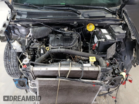 2019 Dodge Grand Caravan GT with VIN 2C4RDGEG9KR694822, listed as a Copart auction lot 50959695 with 121,697 mi miles and Salvage Title. Bid and sale history available at DreamBid. Image 13.
