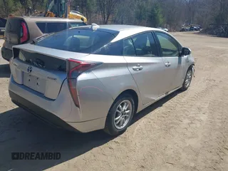 2016 Toyota Prius Two z VIN JTDKBRFU7G3005478, wystawiony jako IAAI lot #42103298 z przebiegiem 68 203 mil mil oraz . Historia ofert i sprzedaży dostępna na DreamBid. Obrazek 4.