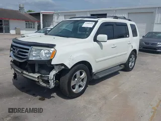 2014 Honda Pilot EX-L with VIN 5FNYF4H52EB055549, listed as a IAAI auction lot 42086456 with 292,594 mi miles and . Bid and sale history available at carsss.com. Image 2.