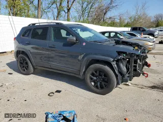 2016 Jeep Cherokee Trailhawk with VIN 1C4PJMBS3GW335696, listed as a Copart auction lot 51296835 with 115,591 mi miles and Salvage Title. Bid and sale history available at carsss.com. Image 4.