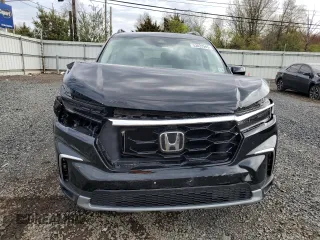 2025 Honda Pilot Elite z VIN 5FNYG1H83SB028135, wystawiony jako Copart lot #53022945 z przebiegiem 15 805 mil mil oraz Szkoda całkowita • Salvage title. Historia ofert i sprzedaży dostępna na DreamBid. Obrazek 5.