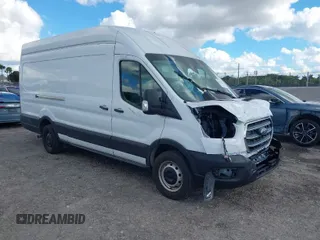 2021 Ford Transit Cargo with VIN 1FTBW3X8XMKA14051, listed as a IAAI auction lot 41672248 with 127,438 mi miles. Bid and sale history available at carsss.com. Image 1.