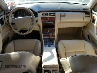 1997 Mercedes-Benz E-Class with VIN WDBJF72F0VA523161, listed as a Copart auction lot 77752804 with 143,495 mi miles and Salvage Title. Bid and sale history available at carsss.com. Image 8.