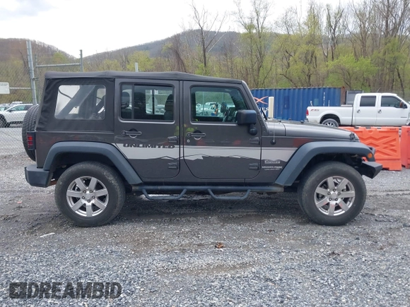 2018 Jeep Wrangler JK Unlimited Sport S with VIN 1C4BJWDG8JL895981, listed as a IAAI auction lot 42048316 with 95,457 mi miles. Bid and sale history available at carsss.com. Image 12.