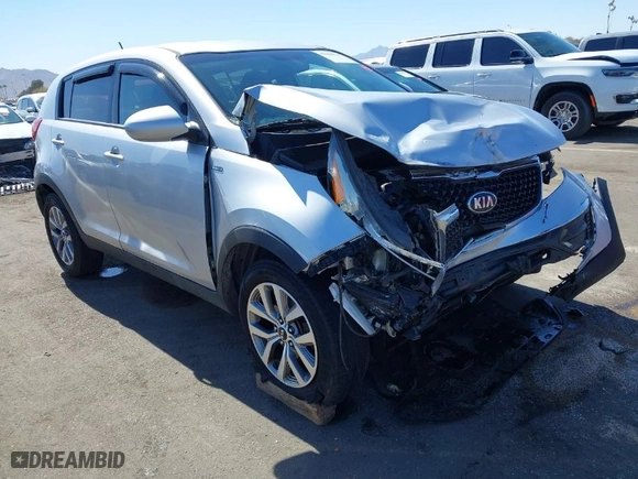 2015 Kia Sportage LX with VIN KNDPBCAC3F7678745, listed as a IAAI auction lot 41664074 with 124,526 mi miles. Bid and sale history available at carsss.com. Image 1.