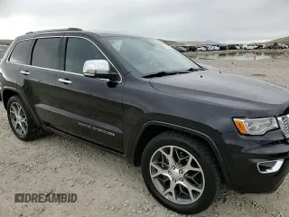 2020 Jeep Grand Cherokee Overland with VIN 1C4RJFCG9LC264711, listed as a Copart auction lot 51505885 with 52,670 mi miles and Salvage Title. Bid and sale history available at DreamBid. Image 12.