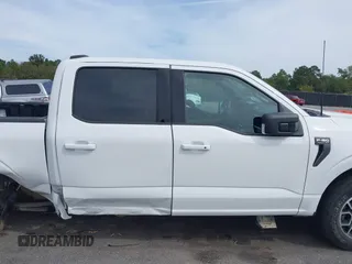 2021 Ford F-150 XL z VIN 1FTFW1E86MFC44784, wystawiony jako IAAI lot #40562636 z przebiegiem 56 427 mil mil oraz . Historia ofert i sprzedaży dostępna na DreamBid. Obrazek 13.