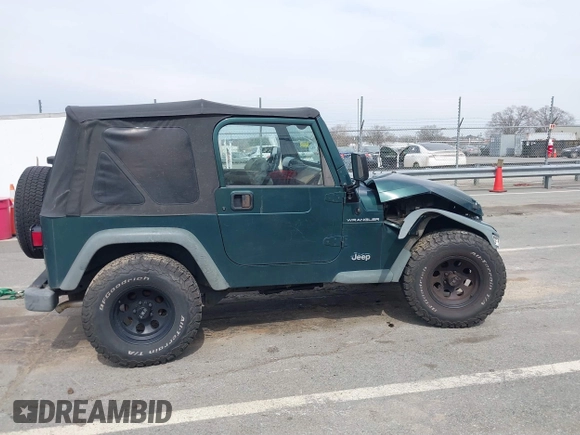 2000 Jeep Wrangler SE with VIN 1J4FA29P0YP728370, listed as a IAAI auction lot 41788463 with 186,995 mi miles. Bid and sale history available at carsss.com. Image 13.