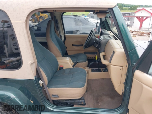 1999 Jeep Wrangler Sahara with VIN 1J4FY49S5XP482037, listed as a IAAI auction lot 42341723 with 161,081 mi miles and . Bid and sale history available at DreamBid. Image 5.