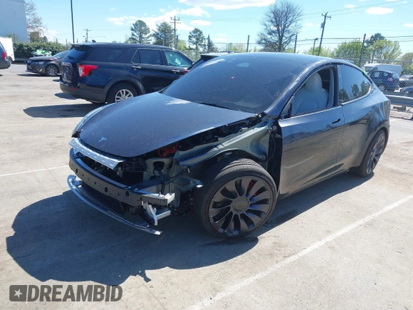 2024 Tesla Model Y Performance with VIN 7SAYGDEF1RA329825, listed as a IAAI auction lot 41762602 with 3,923 mi miles and . Bid and sale history available at DreamBid. Image 21.