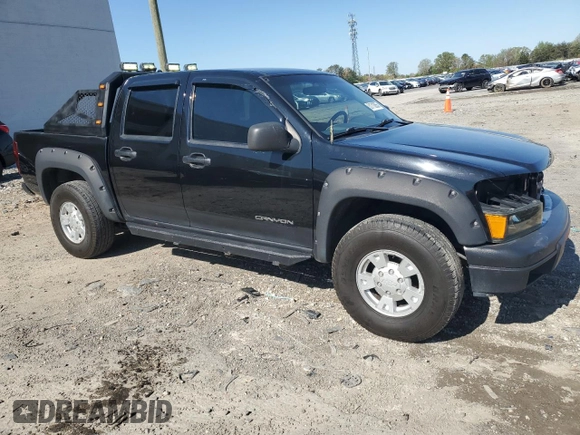 2005 GMC Canyon 1SF SLE Z71 z VIN 1GTDT136458227828, wystawiony jako Copart lot #51713055 z przebiegiem 79 594 mil mil oraz Czysty tytuł • Clean title. Historia ofert i sprzedaży dostępna na DreamBid. Obrazek 4.
