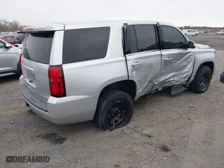 2018 Chevrolet Tahoe Commercial with VIN 1GNLCDEC0JR276911, listed as a IAAI auction lot 40809423 with 110,163 mi miles. Bid and sale history available at carsss.com. Image 4.