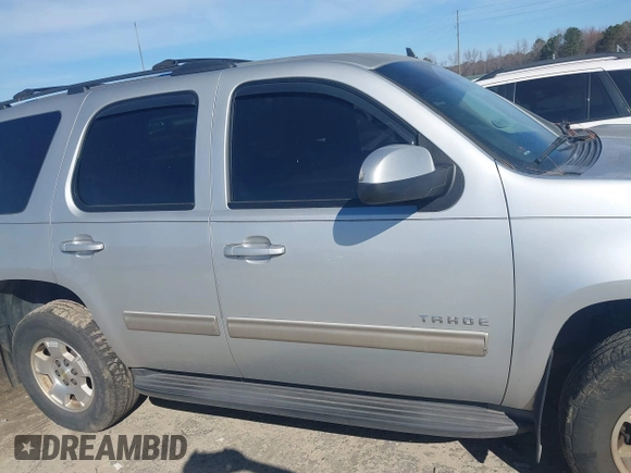 2013 Chevrolet Tahoe LS with VIN 1GNSCAE00DR361459, listed as a IAAI auction lot 41614458 with 171,925 mi miles and . Bid and sale history available at DreamBid. Image 13.