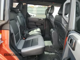 2024 Ford Bronco Big Bend z VIN 1FMDE7BH7RLA10353, wystawiony jako Copart lot #54209345 z przebiegiem 10 606 mil mil oraz Szkoda całkowita • Salvage title. Historia ofert i sprzedaży dostępna na DreamBid. Obrazek 11.