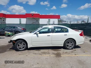 2005 Infiniti G35 with VIN JNKCV51F05M311537, listed as a IAAI auction lot 42051242 with 205,105 mi miles and . Bid and sale history available at carsss.com. Image 15.