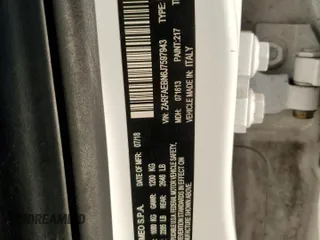 2018 Alfa Romeo Giulia z VIN ZARFAEBN6J7597943, wystawiony jako Copart lot #88288745 z przebiegiem 105 551 mil mil oraz Szkoda całkowita • Salvage title. Historia ofert i sprzedaży dostępna na DreamBid. Obrazek 14.