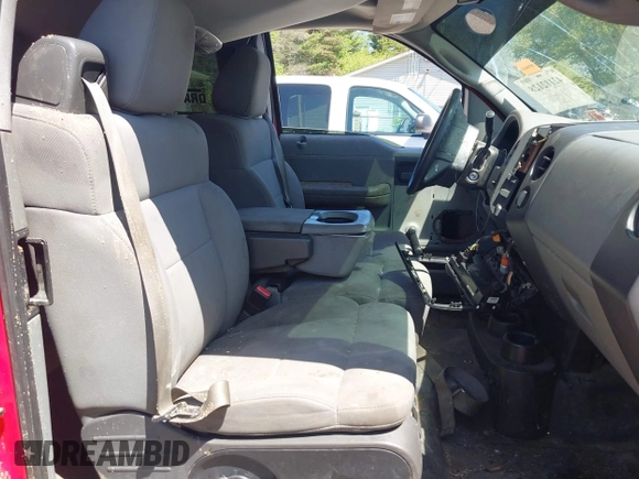 2005 Ford F-150 STX with VIN 1FTRX14W35NC00694, listed as a IAAI auction lot 42112128 with 157,067 mi miles and . Bid and sale history available at carsss.com. Image 5.