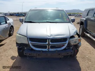 2014 Dodge Grand Caravan SXT with VIN 2C4RDGCG2ER262466, listed as a IAAI auction lot 41928445 with 218,380 mi miles. Bid and sale history available at carsss.com. Image 6.