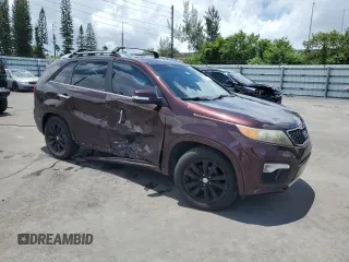 2012 Kia Sorento SX with VIN 5XYKW4A29CG308152, listed as a Copart auction lot 64895355 with 126,816 mi miles and Salvage title. Bid and sale history available at DreamBid. Image 4.
