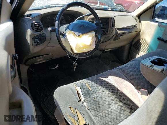 2002 Ford F-150 XL with VIN 1FTRF17212NB27204, listed as a Copart auction lot 50249885 with 0 mi miles and Salvage Title. Bid and sale history available at carsss.com. Image 8.