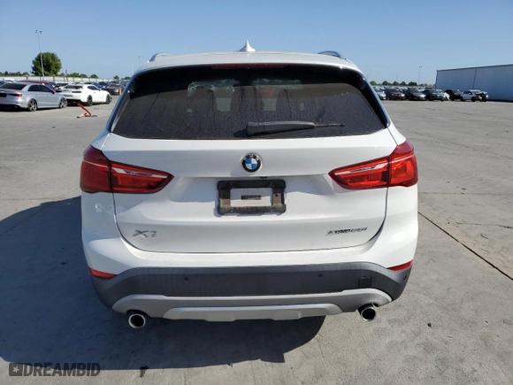 2019 BMW X1 xDrive28i with VIN WBXHT3C53K5L35670, listed as a Copart auction lot 53493245 with 14,201 mi miles and Salvage Title. Bid and sale history available at carsss.com. Image 6.