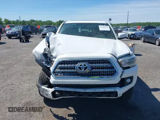 2016 Toyota Tacoma SR with VIN 3TMCZ5AN0GM003224, listed as a IAAI auction lot 42289910 with 140,899 mi miles and . Bid and sale history available at DreamBid. Image 12.