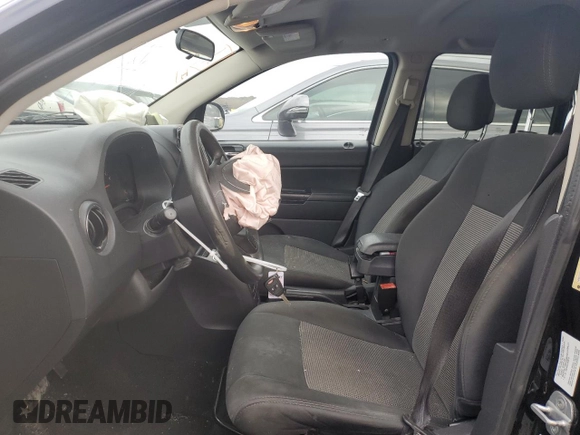 2012 Jeep Compass Sport with VIN 1C4NJCBB2CD613575, listed as a Copart auction lot 85057354 with 203,677 mi miles and Salvage Title. Bid and sale history available at carsss.com. Image 7.