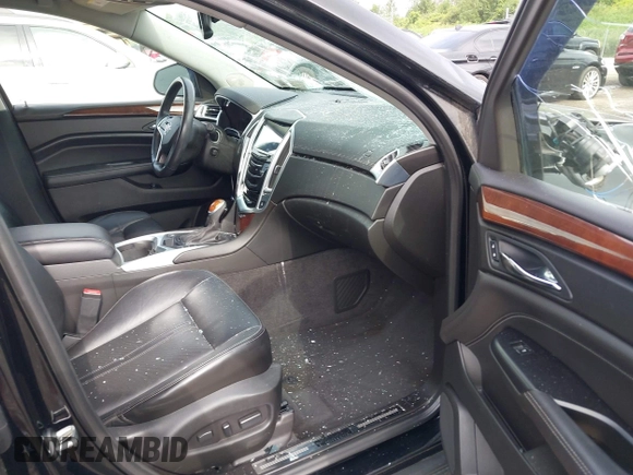 2015 Cadillac SRX Performance Collection with VIN 3GYFNFE35FS591343, listed as a IAAI auction lot 42644949 with 118,718 mi miles and . Bid and sale history available at DreamBid. Image 5.