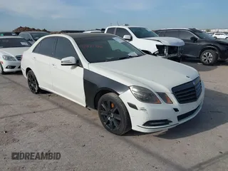 2012 Mercedes-Benz E-Class E 350 Luxury with VIN WDDHF8JBXCA595315, listed as a IAAI auction lot 41871462 with 122,677 mi miles. Bid and sale history available at carsss.com. Image 1.