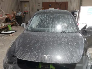 2025 Tesla Model 3 Long Range with VIN 5YJ3E1EA4SF913869, listed as a IAAI auction lot 41416608 with 1,141 mi miles and . Bid and sale history available at DreamBid. Image 10.