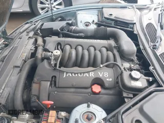 2002 Jaguar XK with VIN SAJDA42CX2NA28816, listed as a IAAI auction lot 42029672 with 130,978 mi miles and . Bid and sale history available at DreamBid. Image 10.