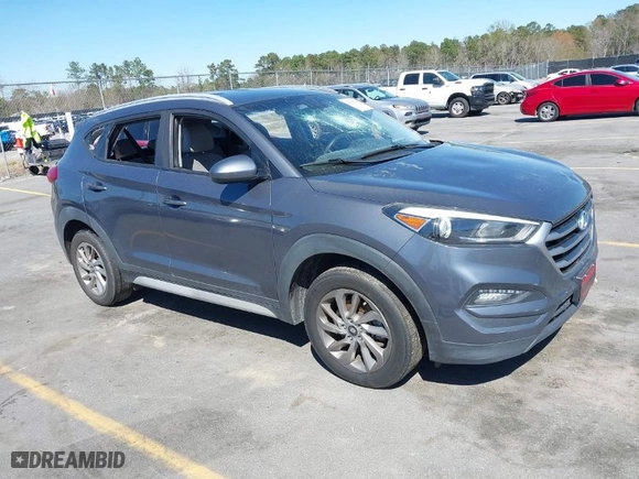 2018 Hyundai Tucson SEL with VIN KM8J3CA48JU718402, listed as a IAAI auction lot 41810363 with 218,853 mi miles. Bid and sale history available at carsss.com. Image 1.