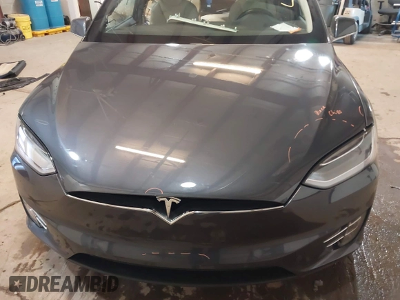 2016 Tesla Model X 70D with VIN 5YJXCBE2XGF025303, listed as a IAAI auction lot 41558869 with 77,793 mi miles and . Bid and sale history available at DreamBid. Image 10.